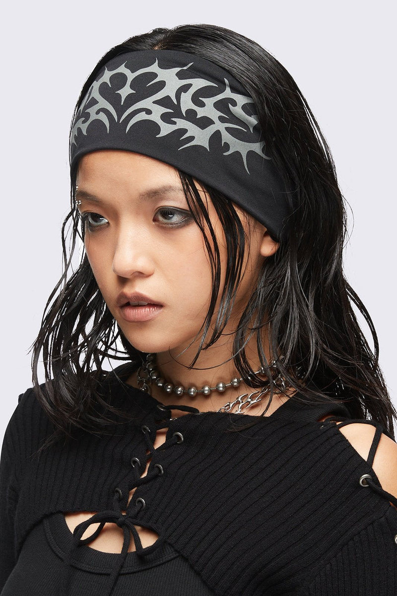 Black headband with cyber sigilism heart tattoo print.