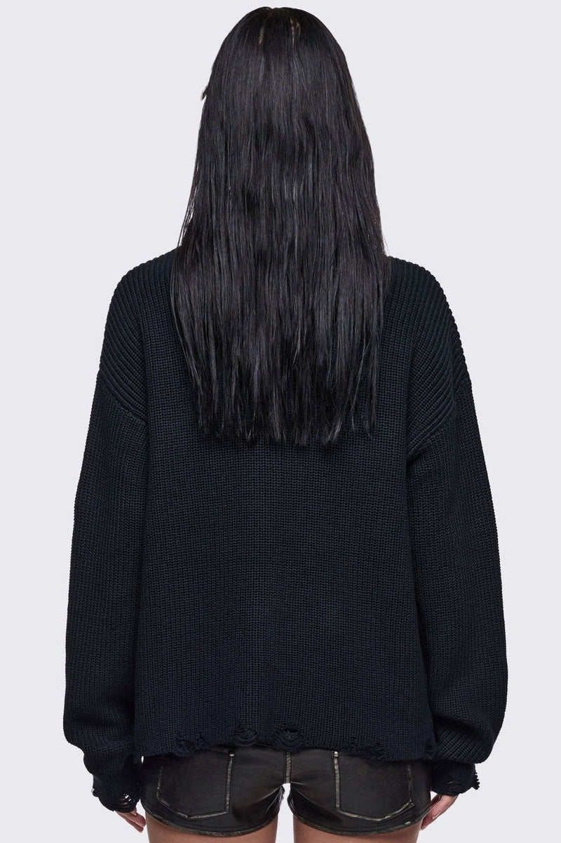 Black knitted distressed jumper with grunge graphic design and stud and O-ring details.