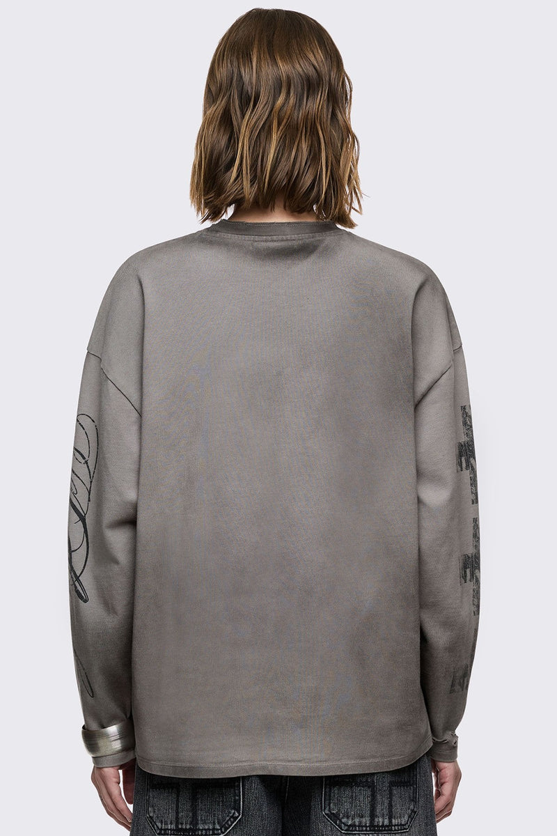 Grey cotton long sleeve T-shirt with cross graphic, studs and distressed hem in a grunge goth style.