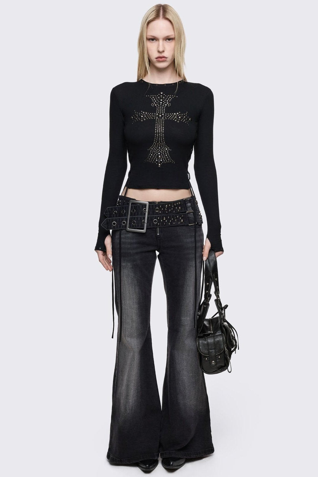 Black long sleeve top with studded cross front design, lace-up side detail and thumbhole cuffs.
