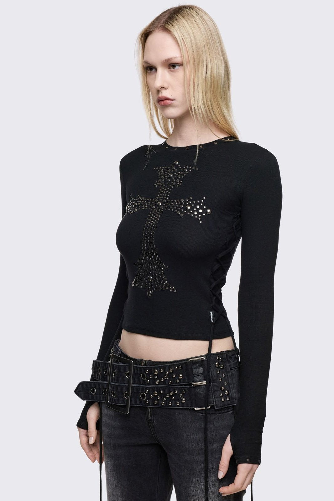 Black long sleeve top with studded cross front design, lace-up side detail and thumbhole cuffs.