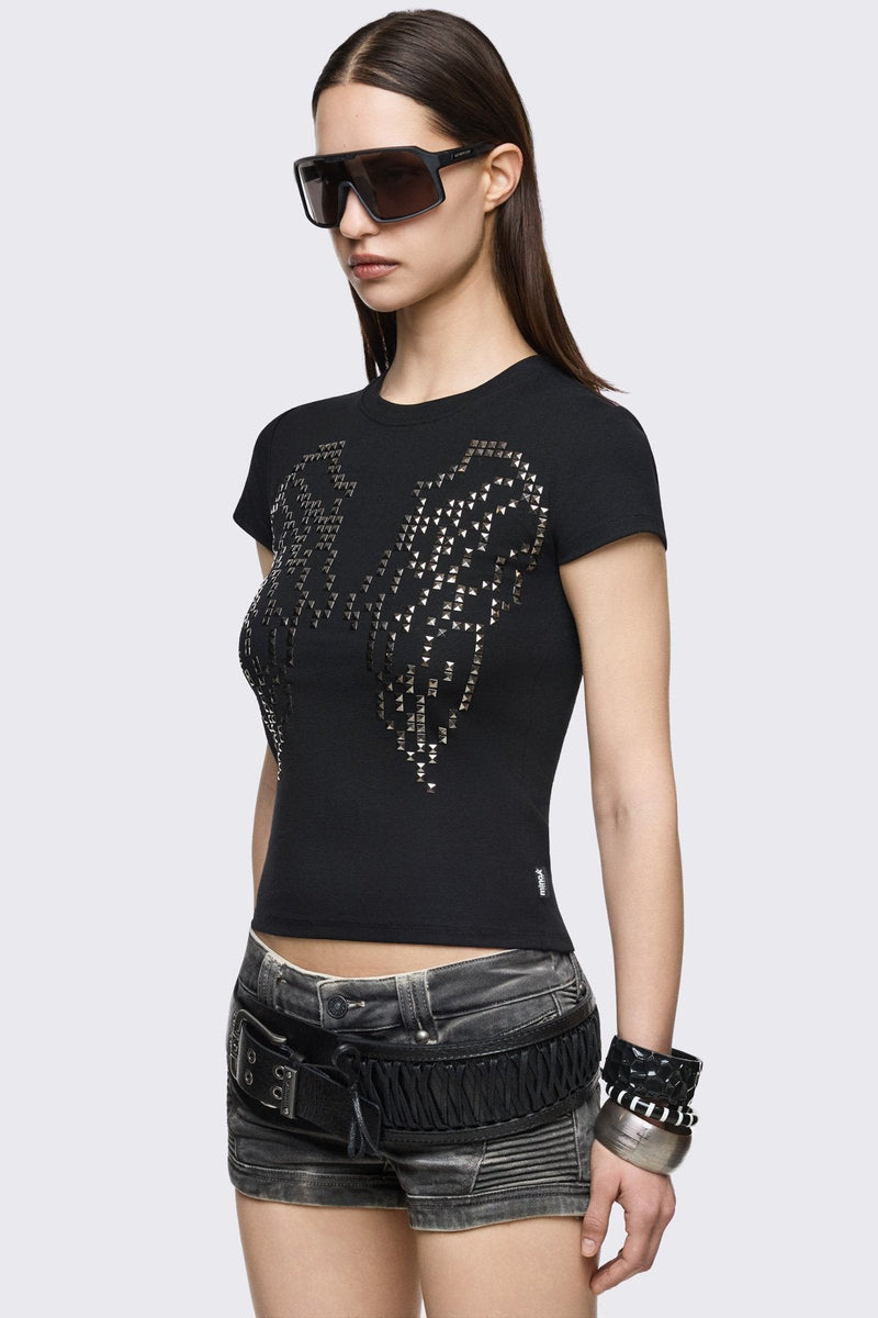 Black cotton baby tee with studded wings graphic, short sleeves and crew neck in a grunge Y2K style.