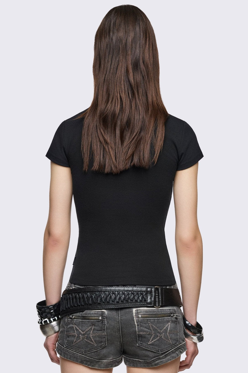 Black cotton baby tee with studded wings graphic, short sleeves and crew neck in a grunge Y2K style.