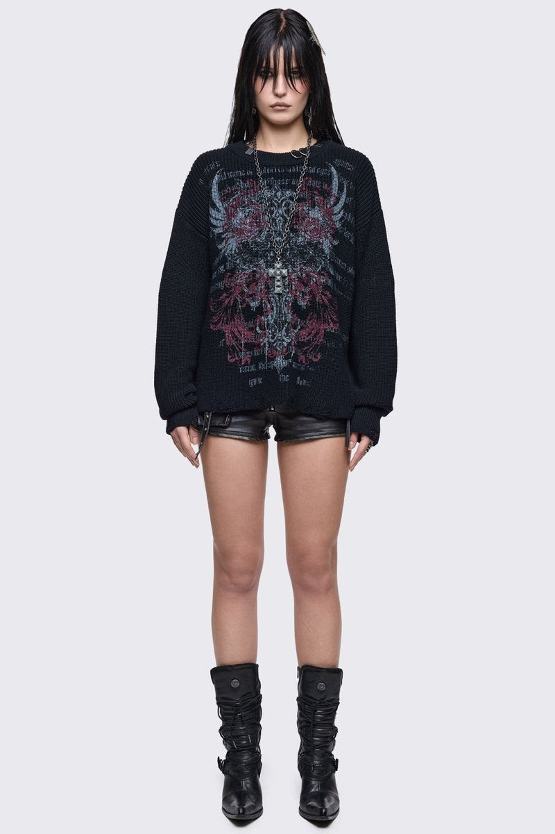 Black knitted distressed jumper with grunge graphic design and stud and O-ring details.