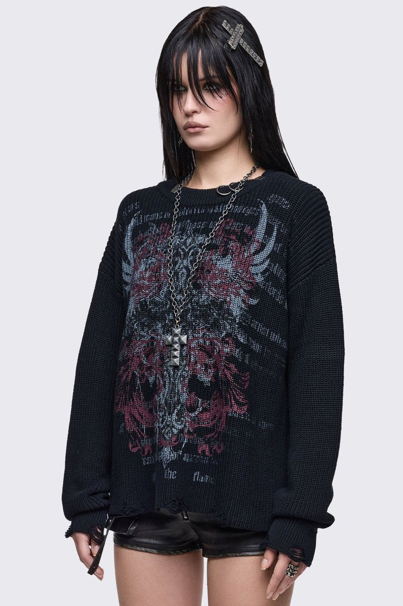 Black knitted distressed jumper with grunge graphic design and stud and O-ring details.