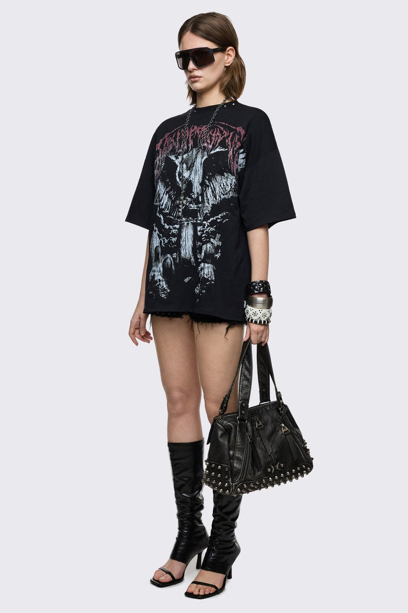 Black cotton T-shirt with dark front graphic print, relaxed fit, and grunge aesthetic.